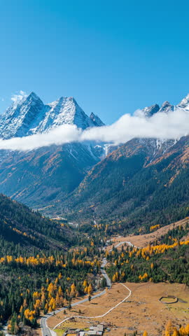 Aerial view of Siguniangshan in autumn, Sichuan in China. Vertical.