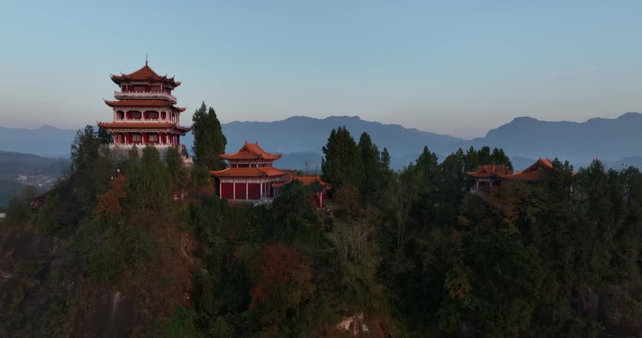 Sunrise and ancient chinese buddha temple landscape in Hunan province,China	