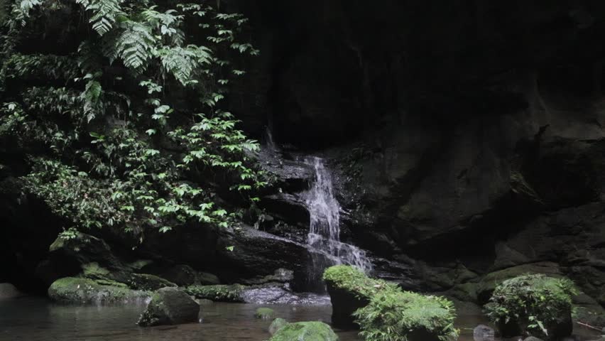 Mystical Forest Oasis - Shaded Twin Falls Inside a Giant Natural Rock Cave