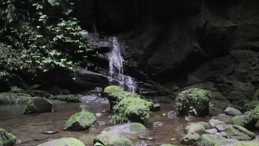 Mystical Forest Oasis - Shaded Twin Falls Inside a Giant Natural Rock Cave