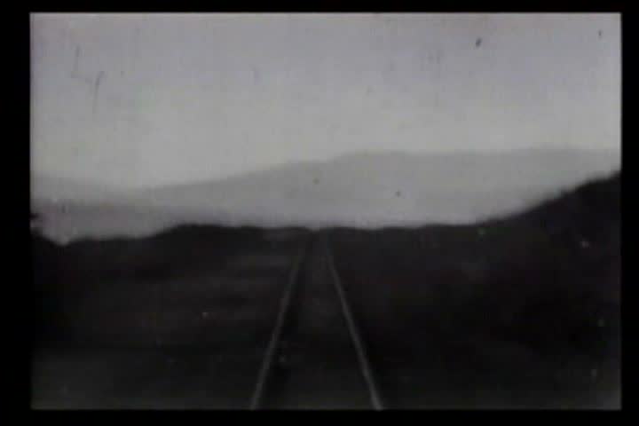 1900s - POV from the front of a train approaching San Francisco Bay and the Golden Gate.