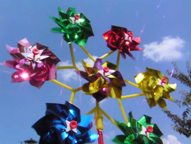 Windmill on blue sky