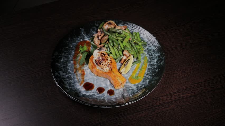 Salmon dish with vegetables on a plate