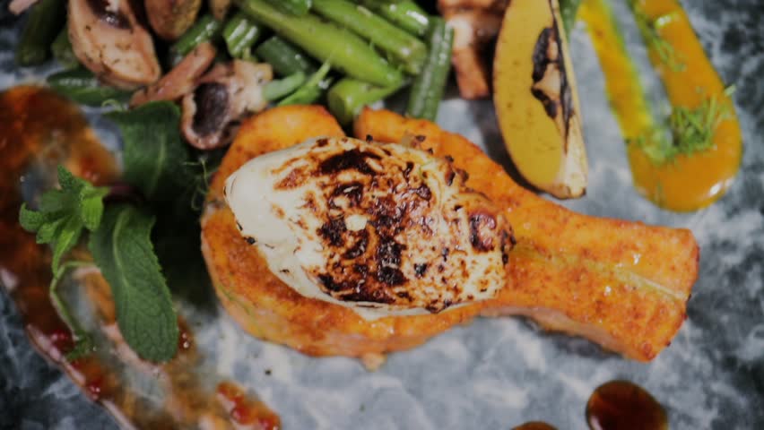 Salmon dish with vegetables on a plate