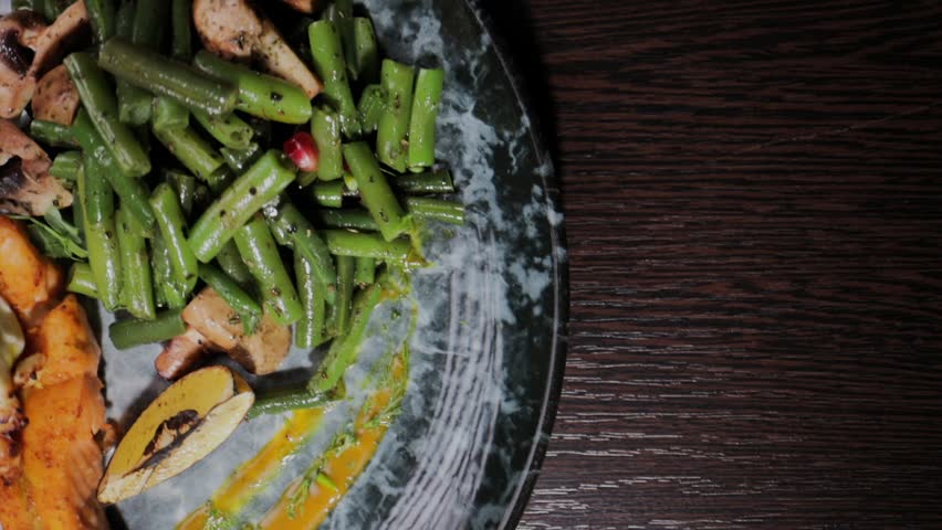 Salmon dish with vegetables on a plate