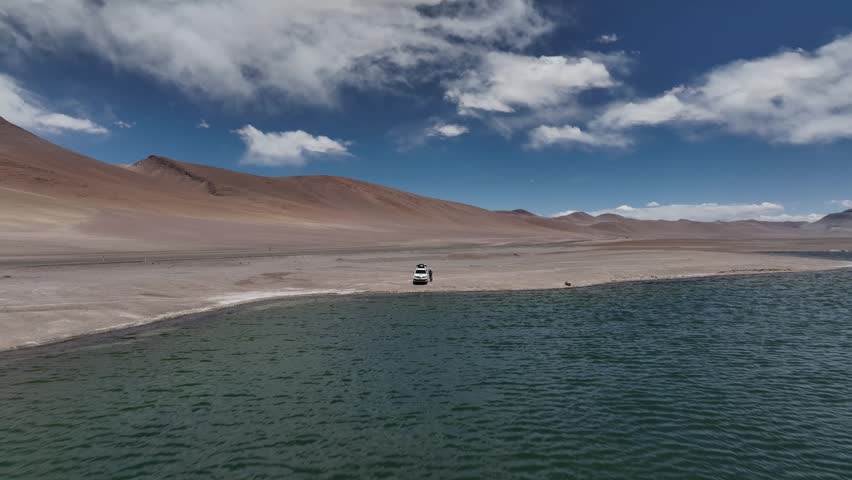 Atacama Desert, Chile. Car on the road. Aerial view by drone.