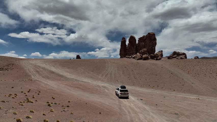 Atacama Desert, Chile. Car on the road. Aerial view by drone.