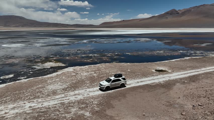 Atacama Desert, Chile. Car on the road. Aerial view by drone.