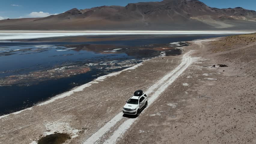 Atacama Desert, Chile. Car on the road. Aerial view by drone.