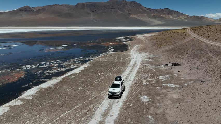 Atacama Desert, Chile. Car on the road. Aerial view by drone.