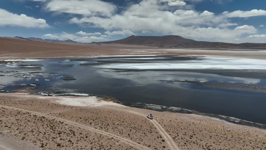 Atacama Desert, Chile. Car on the road. Aerial view by drone.