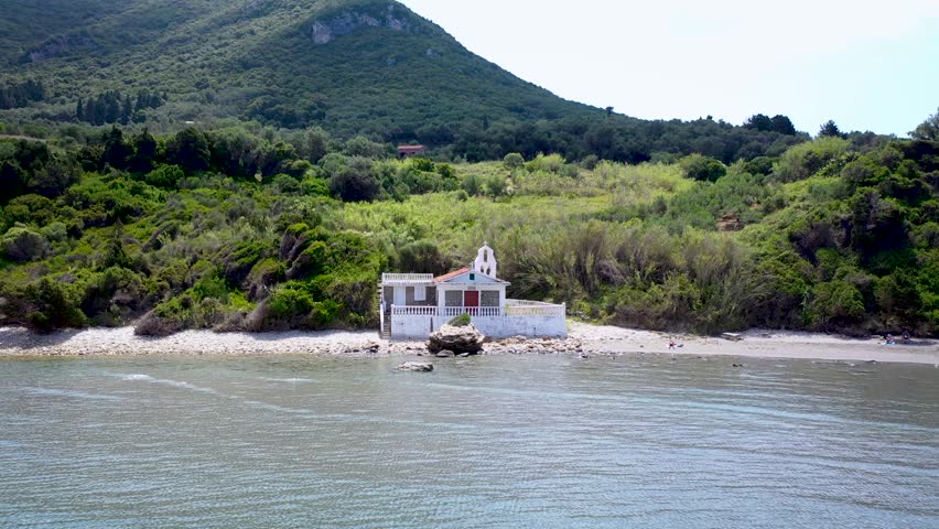 Agios Nikolaos small church on a beach near Paramonas village, Corfu Island, Greece