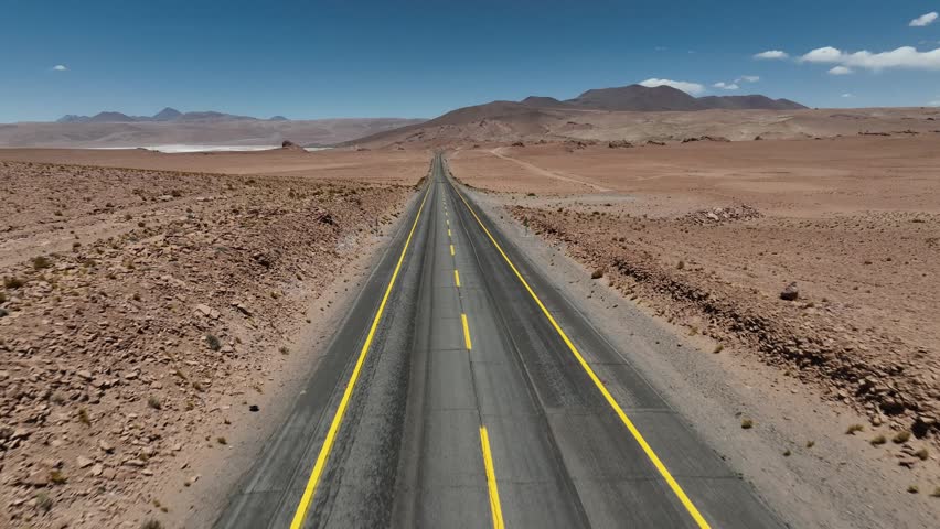 Atacama Desert, Chile. Car on the road. Aerial view by drone.
