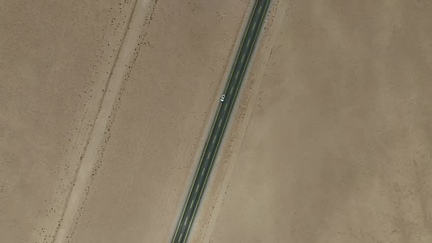Atacama Desert, Chile. Car on the road. Aerial view by drone.
