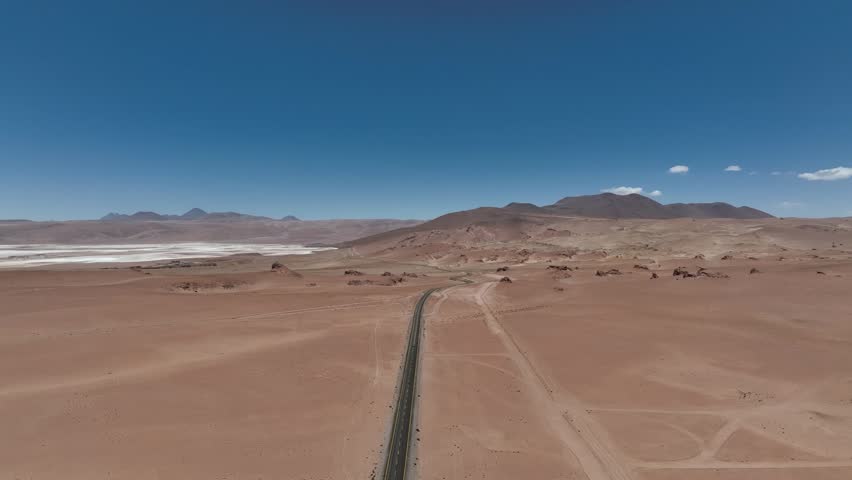 Atacama Desert, Chile. Car on the road. Aerial view by drone.