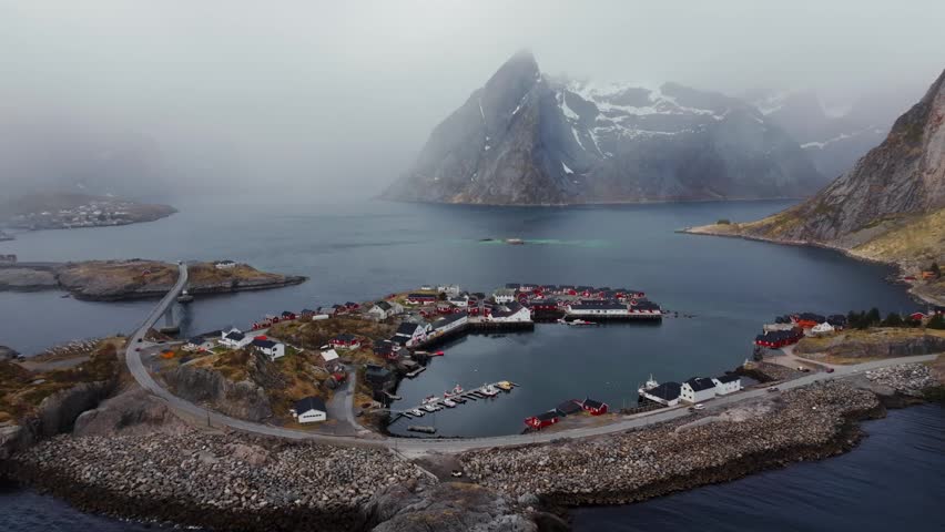 Aerial view of a remote Nordic fishing village on a rocky peninsula