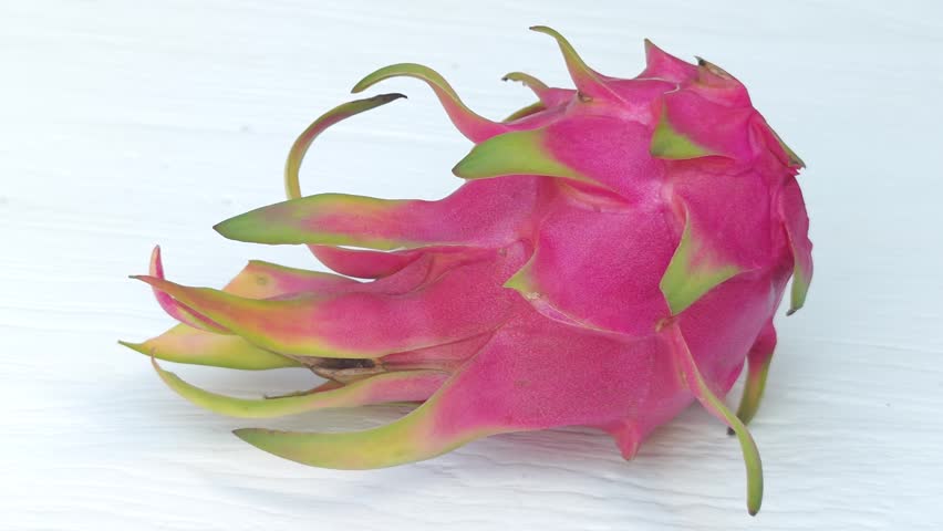 Dragon fruit  on a white wooden 