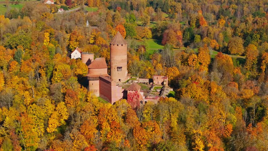 Turaida Castle Rising Above Golden Autumn Forest in Gauja Valley Latvia