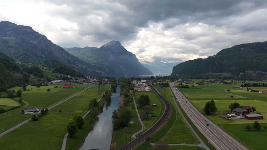 Reuss Valley in Switzerland canton of Uri surrounded by the Swiss Alps, aerial drone