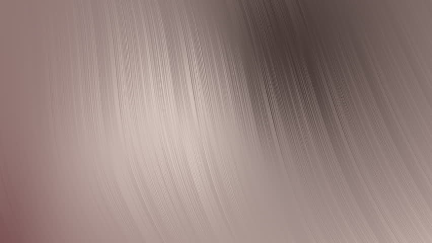 A close-up view of a textured surface featuring fine vertical lines. The image displays a smooth gradient from light to dark tones.