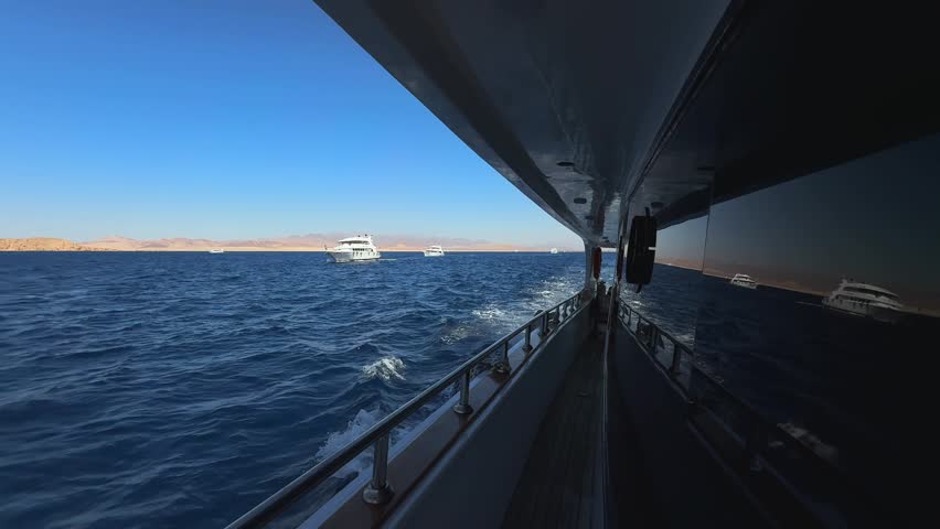 Luxury yacht deck side view floating in the Sea during morning diving safari