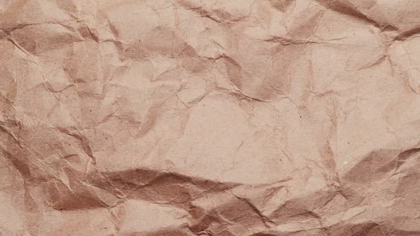 Stop motion of crumpled craft brown paper texture, abstract loop background