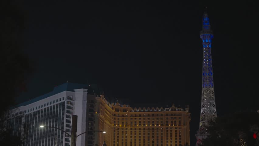 Las Vegas, Nevada - December 13, 2024: Building on left and fake Eiffel Tower on right