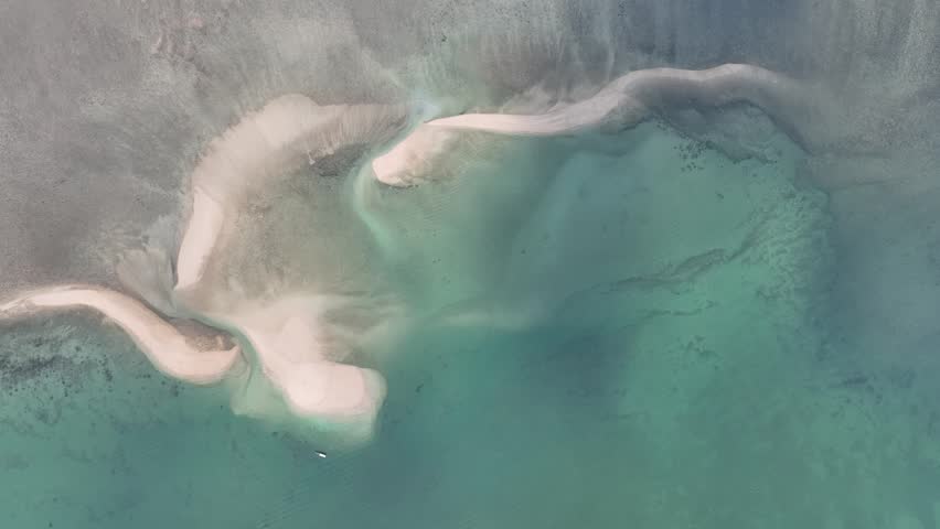 An aerial view of the Thai sea and its beautiful beaches, showcasing important tourist destinations in Thailand.