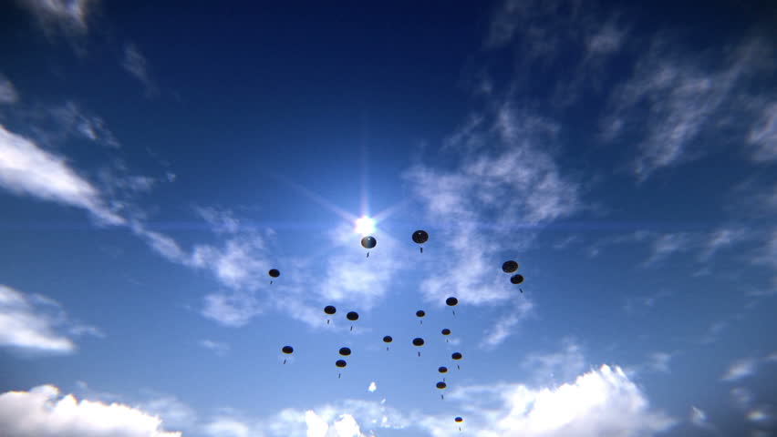 Several paratroopers descending in the sky
