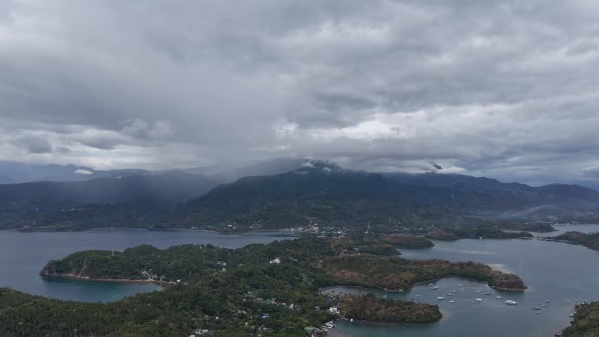 time lapse of light changing over an island mountain
