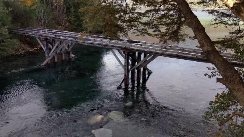 Damaged Pedestrian Bridge Over the Correntoso River in Villa La Angostura Patagonia  
