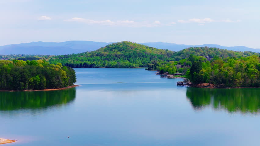 Drone flies over a lake in Louisville, Blount County, Tennessee, USA