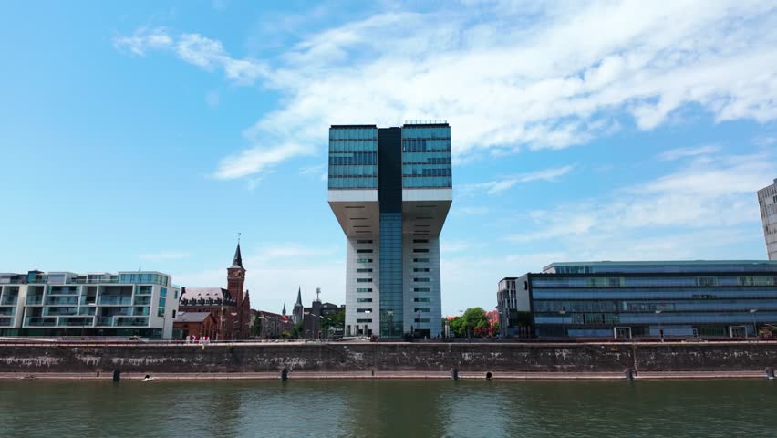 Front view of Kranhaus architecture beside Rhine waterfront in Cologne