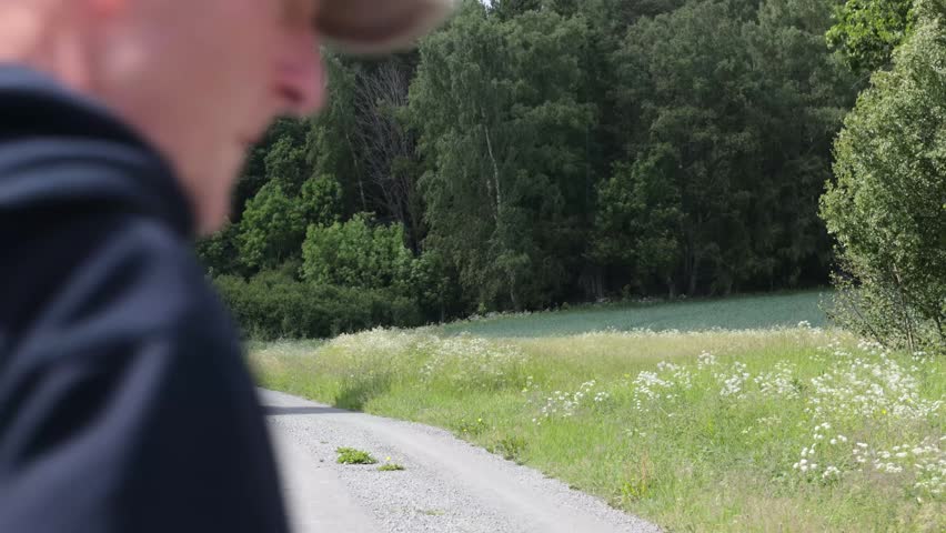 Enkoping, Sweden A man walks through a forest in Uppsala County. 