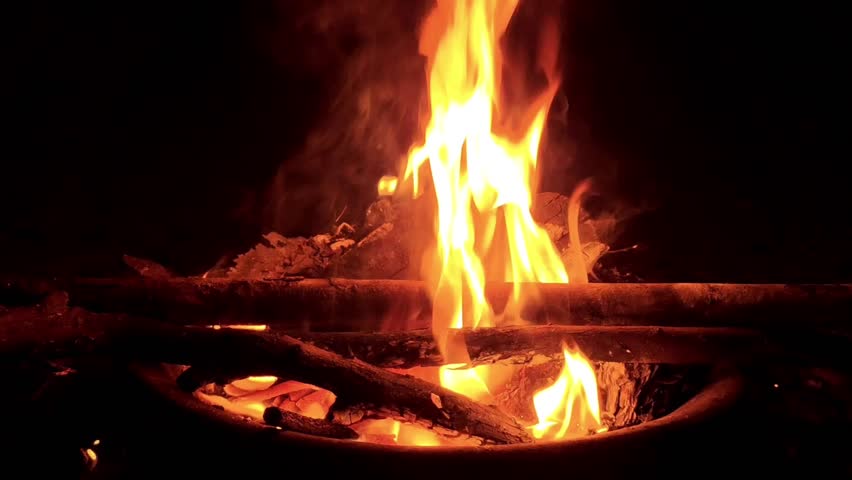 Close up of cozy campfire flames