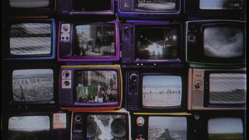 Vintage Television Wall Montage of Retro TV Screens Showing Videos, Tilt Up
