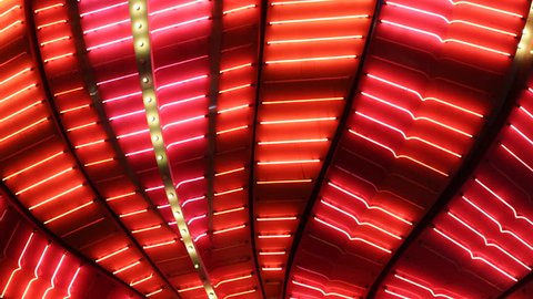 LAS VEGAS, USA - APRIL 2, 2013 Nightlife, Flamingo Hotel Casino Lights Display, Las Vegas Strip, Red Neon Flashing Illuminated Bulbs 