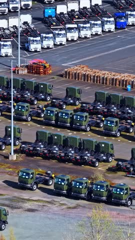 Heavy grade unloaded military trucks parked at Bremerhaven Germany