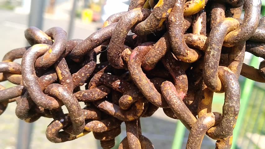 Large Rusty Metal Chain Close-Up, Weathered Industrial Link Texture with Corrosion Details