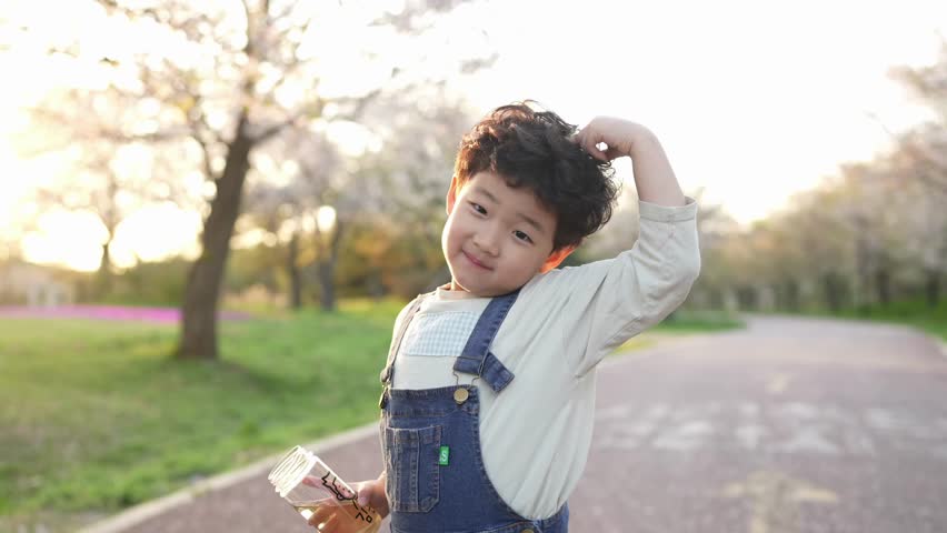Soft golden light bathes the child