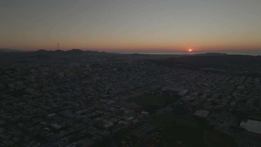 Backward tracking overall sunset view of San Francisco