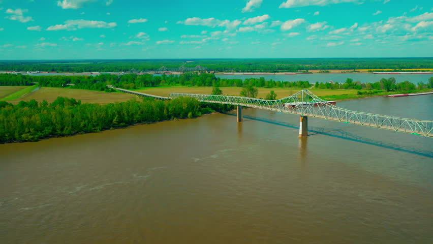 Historic Cairo Mississippi River Iron Bridge on US-60 as traffic crosses the cantilever truss structure near the Illinois Missouri border.