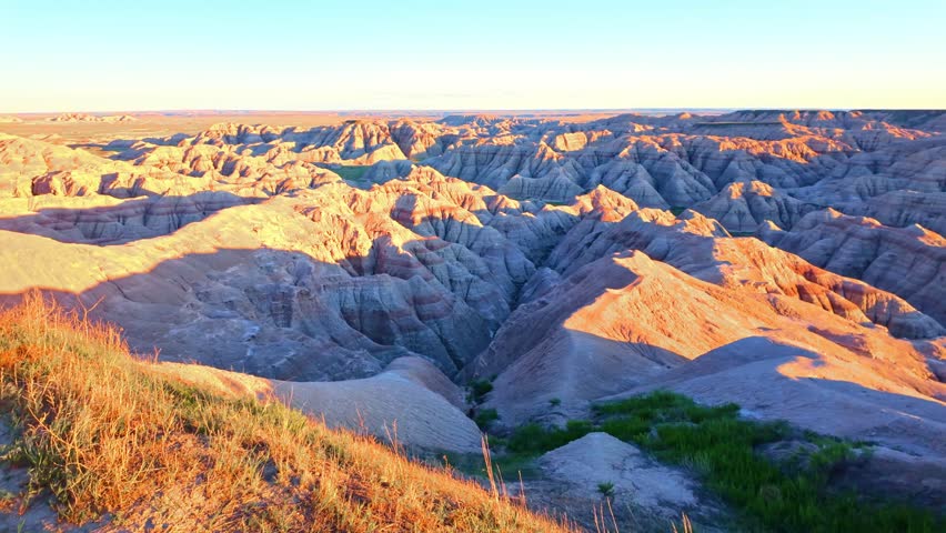 Scenic aerial view of colorful sunset over Badlands National Park from the Pinnacles viewpoint, South Dakota