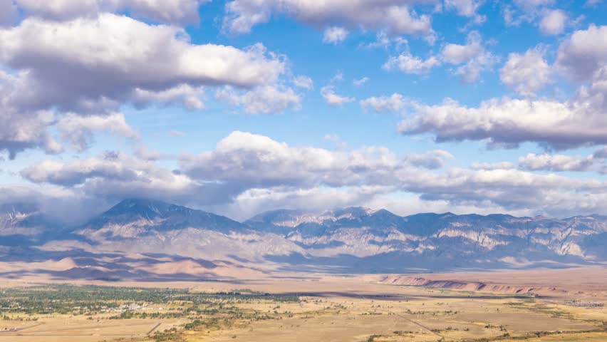 Time Lapse looking west across the Owens Valley and town of Bishop towards the Sierra Nevada Mountains in California