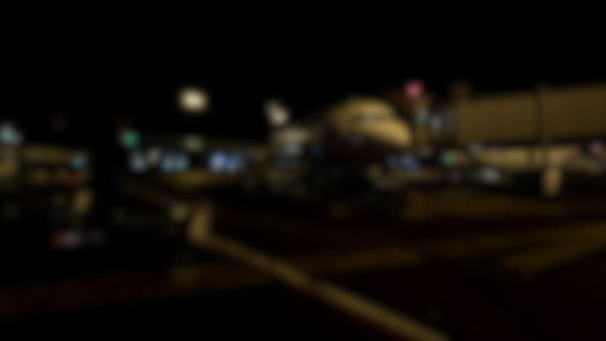 Commercial airplane parked at airport gate during night operations, with boarding bridge, apron lights, ground service and travel scene, privacy protected aviation scene, airport operations, runway