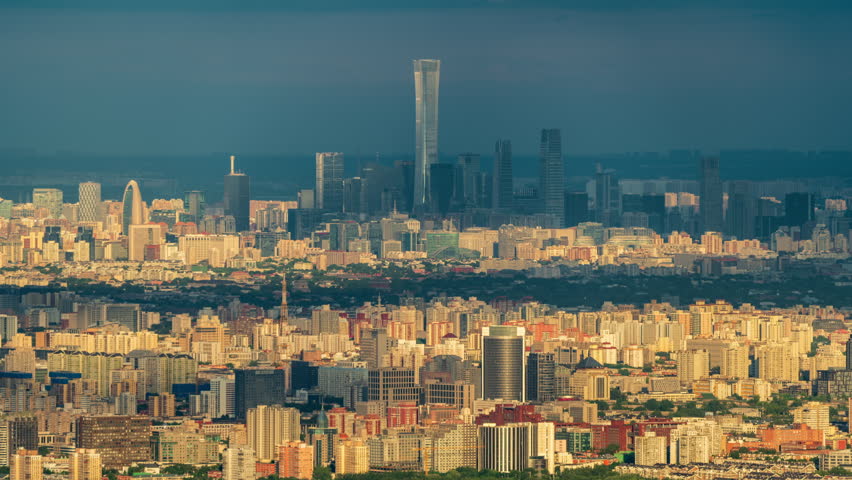 Beijing, China - 9th June 2026 - High Angle Telephoto View of Beijing Downtown Transitioning from Sunset to Night View Featuring Illuminated CBD