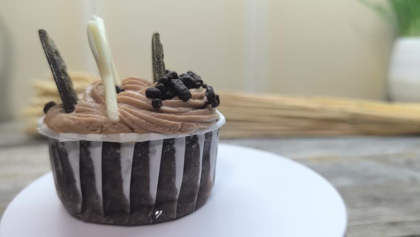 delicious cake on a blue plate on a wooden table 