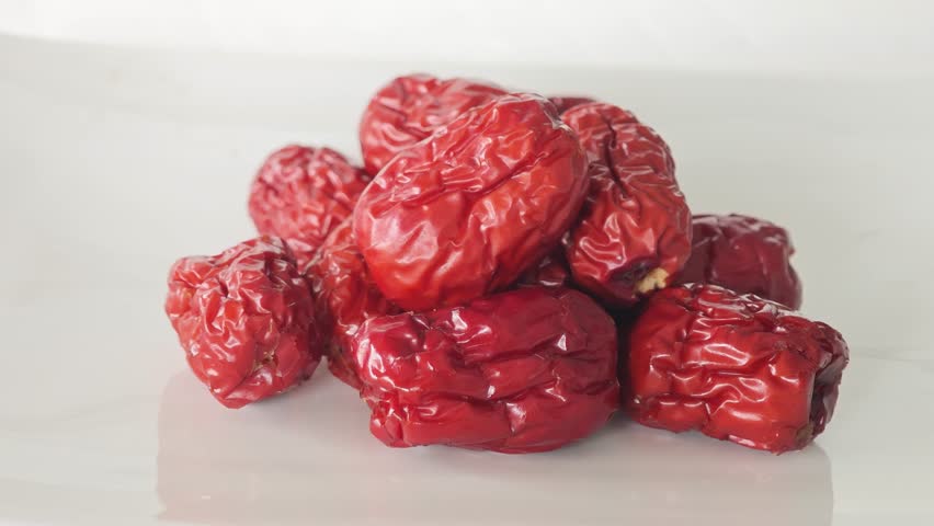  Pile of dried red jujube fruits