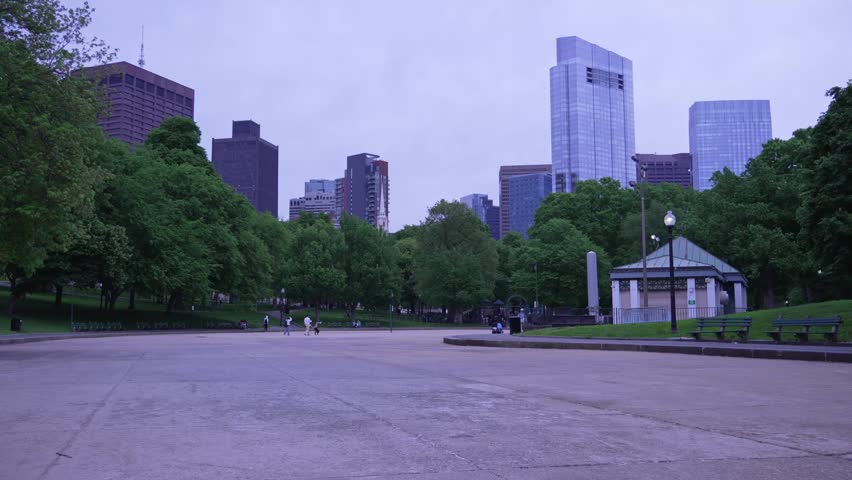 Urban park with city skyline in Boston, USA