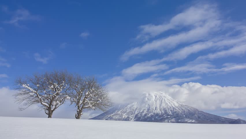 Snow Capped Mount Yotei Ezo Fuji in Winter with Clear Blue Sky Hokkaido Japan Scenic Landscape
